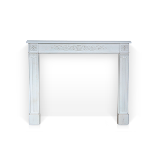 Marquis de Condorcet is a custom-made marble fireplace mantel with an entablature carved in low relief with volutes and vegetal scrolls. 