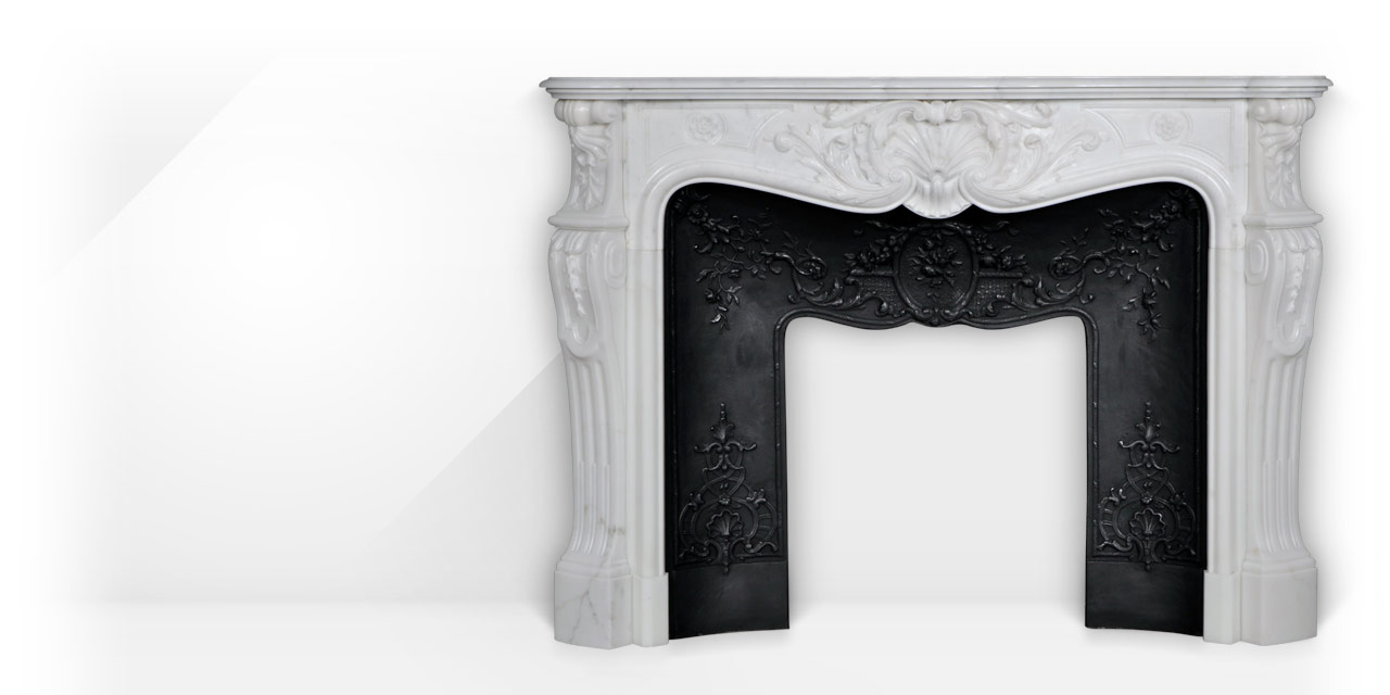 Marquise de Tournelle is a very beautiful custome-made Louis XV style fireplace with opulent carved details.
