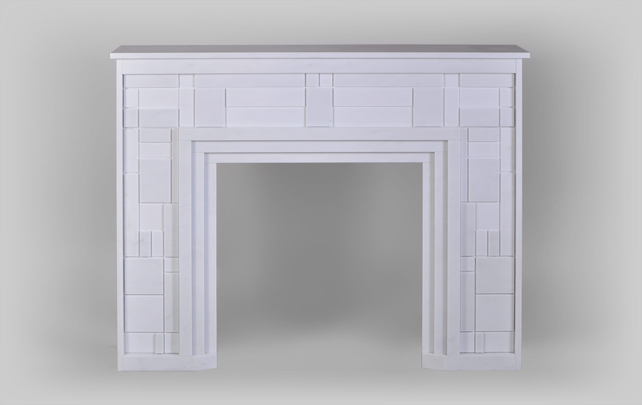 This modern fireplace is made out of Blanc P marble, with smooth, modern outlines, draws on Piet Mondrian's abstract art. Its defined structure and straight lines give the fireplace a balanced composition. It is decorated with an orthogonal grid of different shapes and sizes.The sculpture done on the many marble layers and finishes creates varied reliefs and colors, as light is reflected differently on the rectangles.The optional LED panels can be set on the back of the fireplace to bring out the transparency and finesse of the work on the marble.